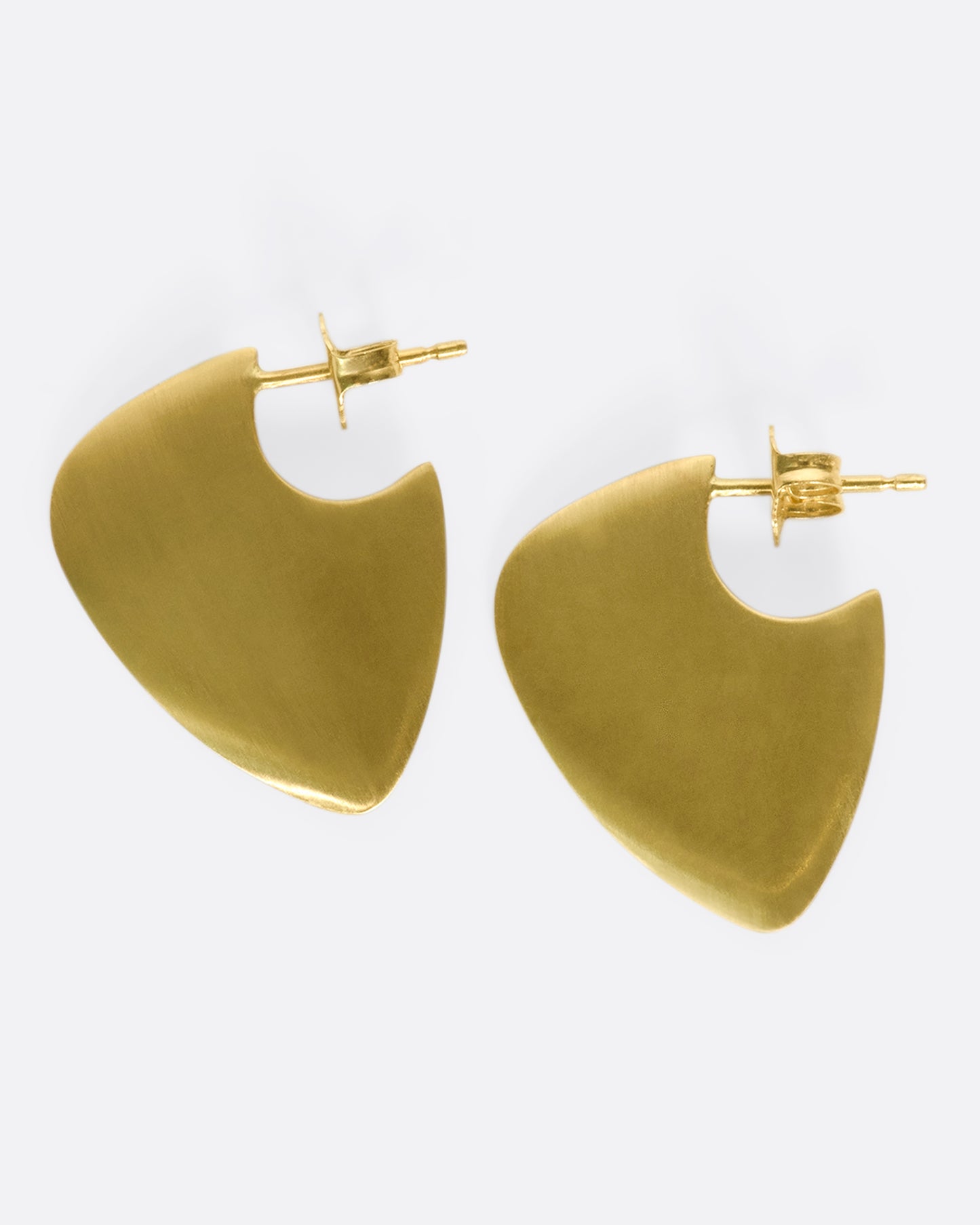 A pair of 10k solid gold hoop earrings with a guitar pick shape.