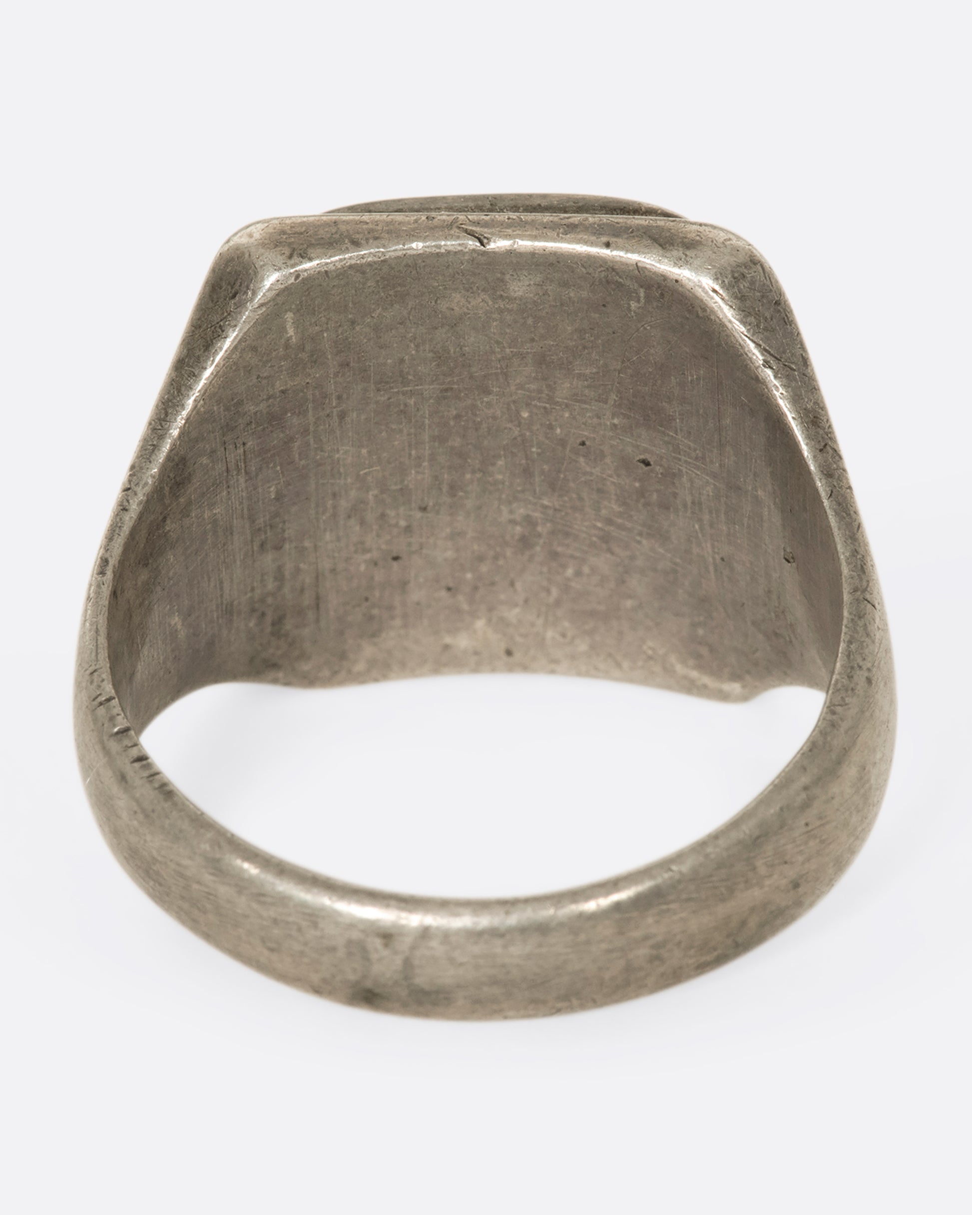 This square-faced 1940s sterling silver signet ring has a copper face with the initials RJ elegantly engraved. Gift accordingly. 