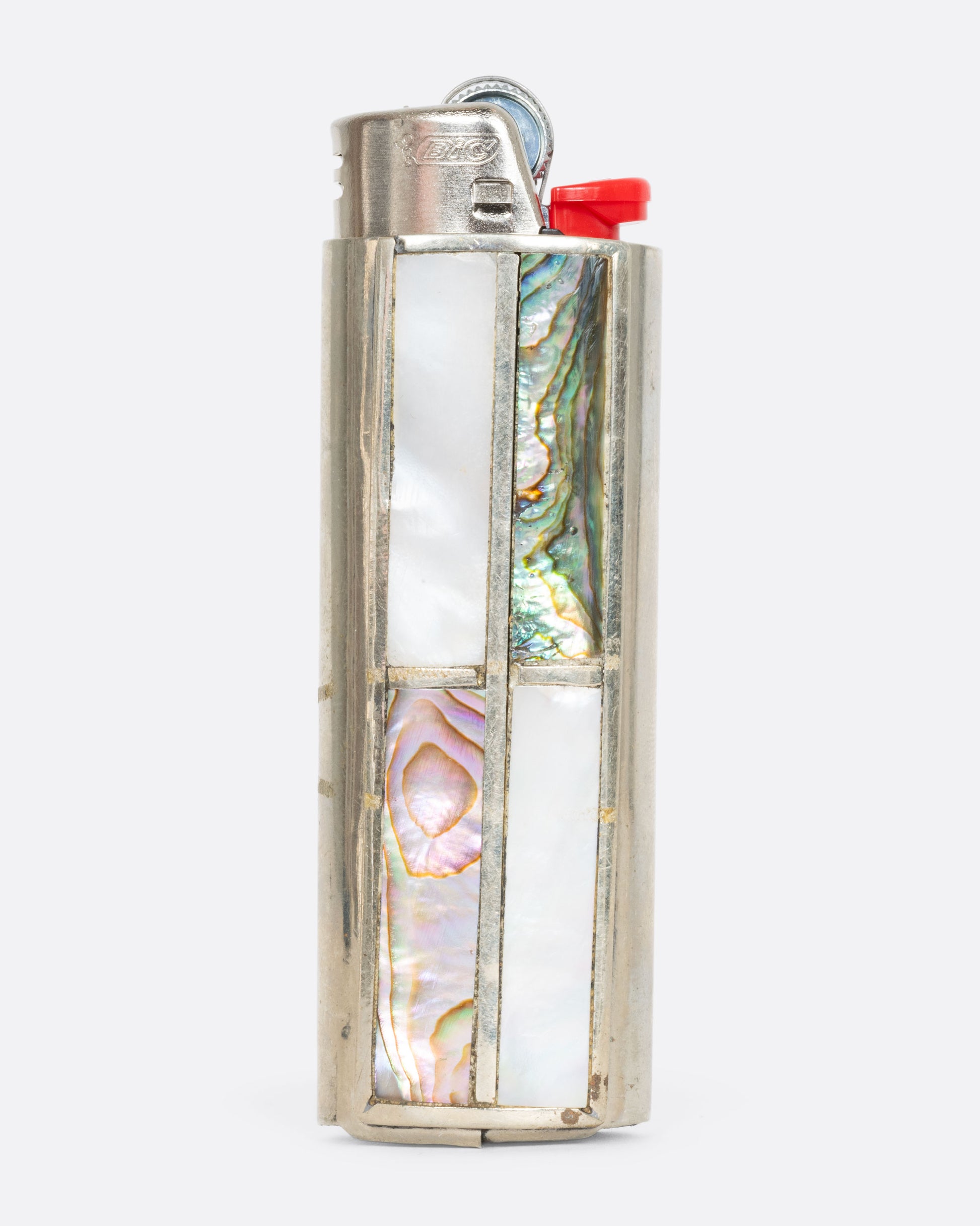 An alpaca silver lighter cover with mother of pearl and abalone. View from the front.