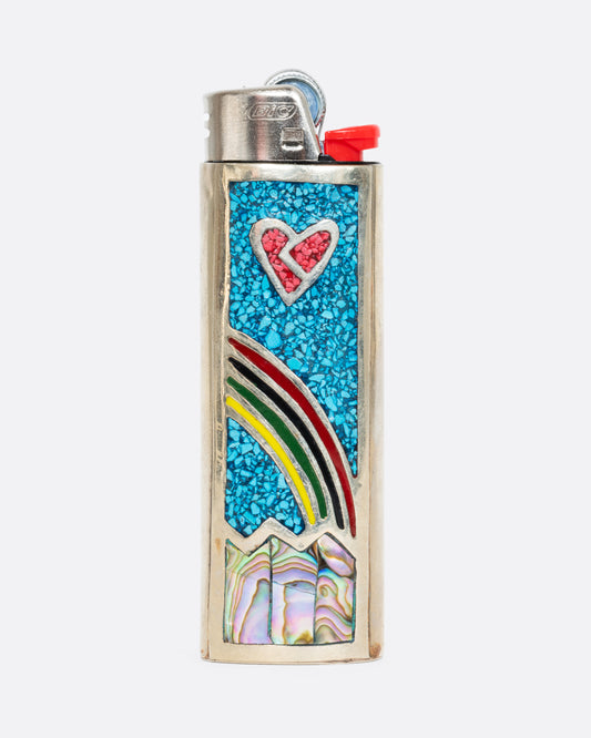 An alpaca silver lighter cover with a rainbow and heart. Shown from the front.