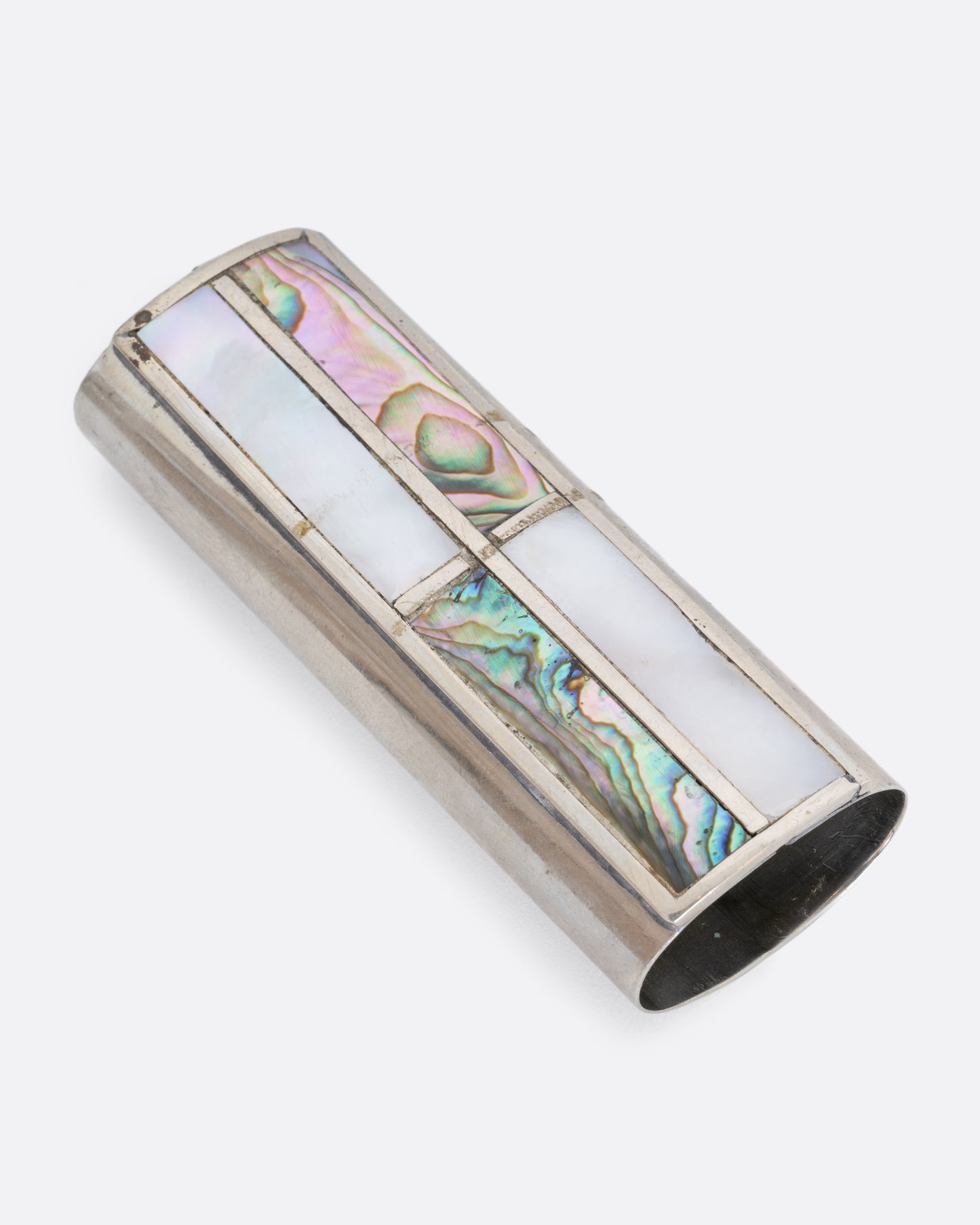 An alpaca silver lighter cover with mother of pearl and abalone. View laying flat.