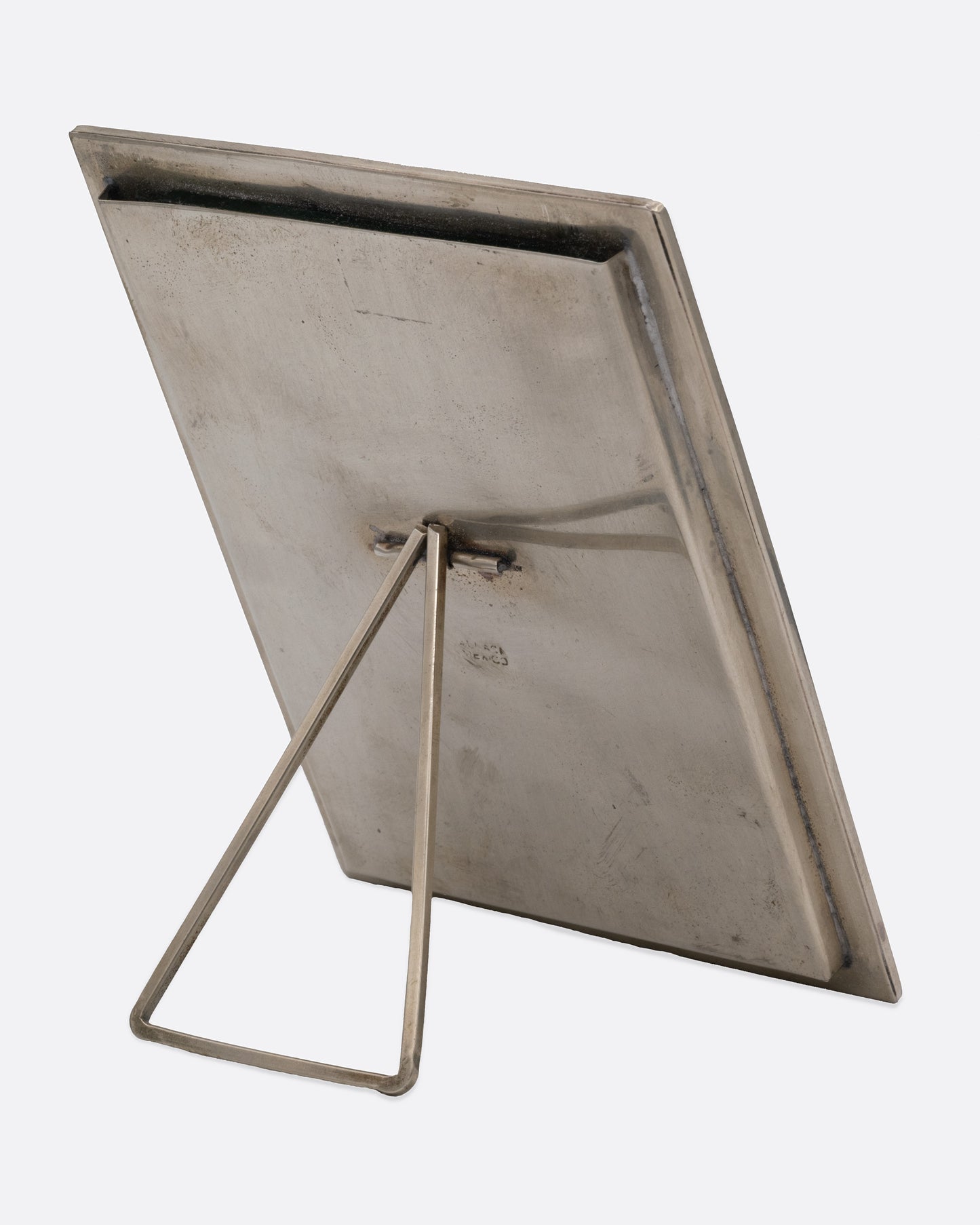 A rectangular silver frame shown from the back.
