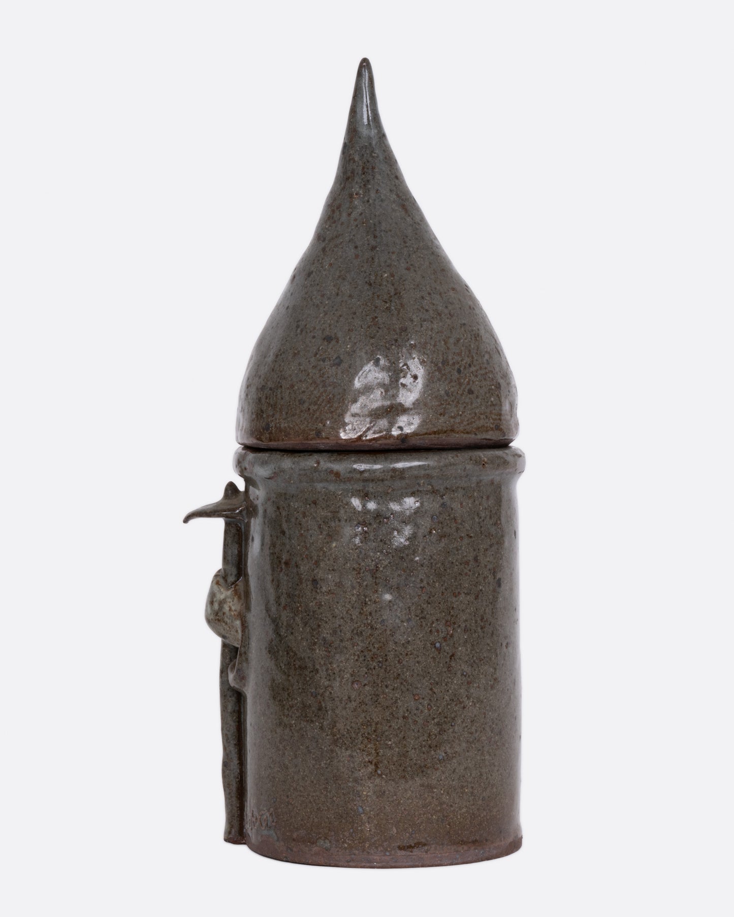 A this ceramic likeness of Saint Fiacre with a removable lid, shown from the back.