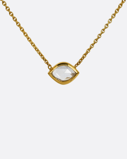 A yellow gold necklace with a  marquis shaped diamond. Shown from the front.