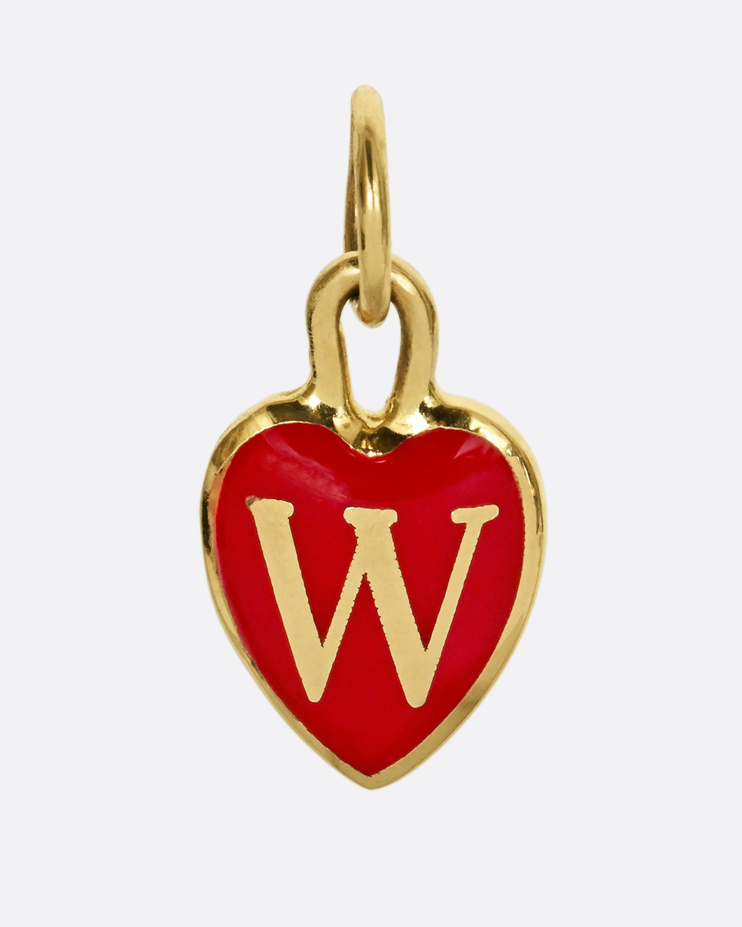 A yellow gold letter "W" heart shaped charm with red enamel. Shown from the front.