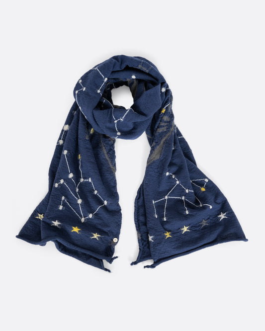 A navy blue scarf with constellations. Shown loosely tied.