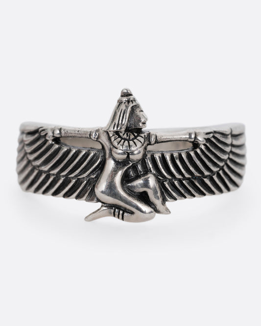 A silver ring with Isis, the ancient Egyptian goddess and powerful magician spreading her wings. Shown from the front.