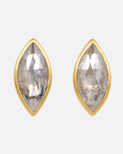 Yellow gold gray navette diamond stud earrings, the pair from the front