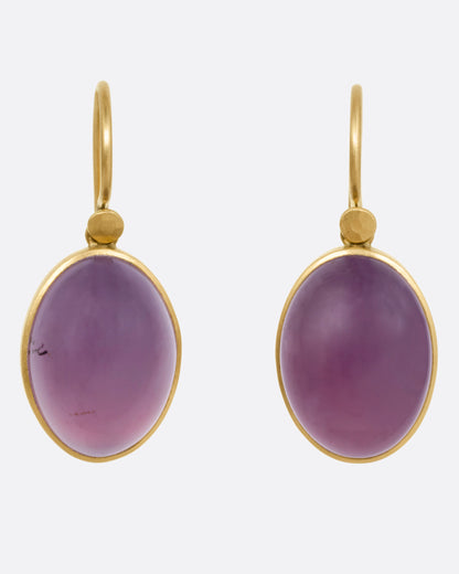 Yellow gold purple chalcedony drop earrings, the pair from the front showing the smooth purple stones