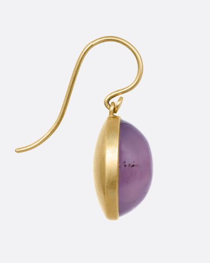 Yellow gold purple chalcedony drop earrings, side view showing the domed stone and hook wire