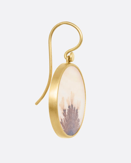 Yellow gold dendritic agate circle drop earrings, side view showing the hook wire and bezel