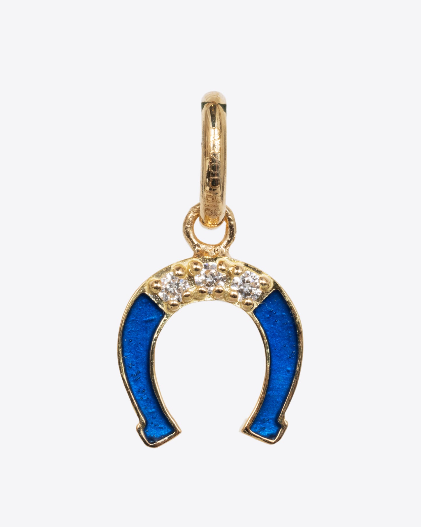 A yellow gold horseshoe charm with lapis blue enamel and white diamonds. Shown from the front.