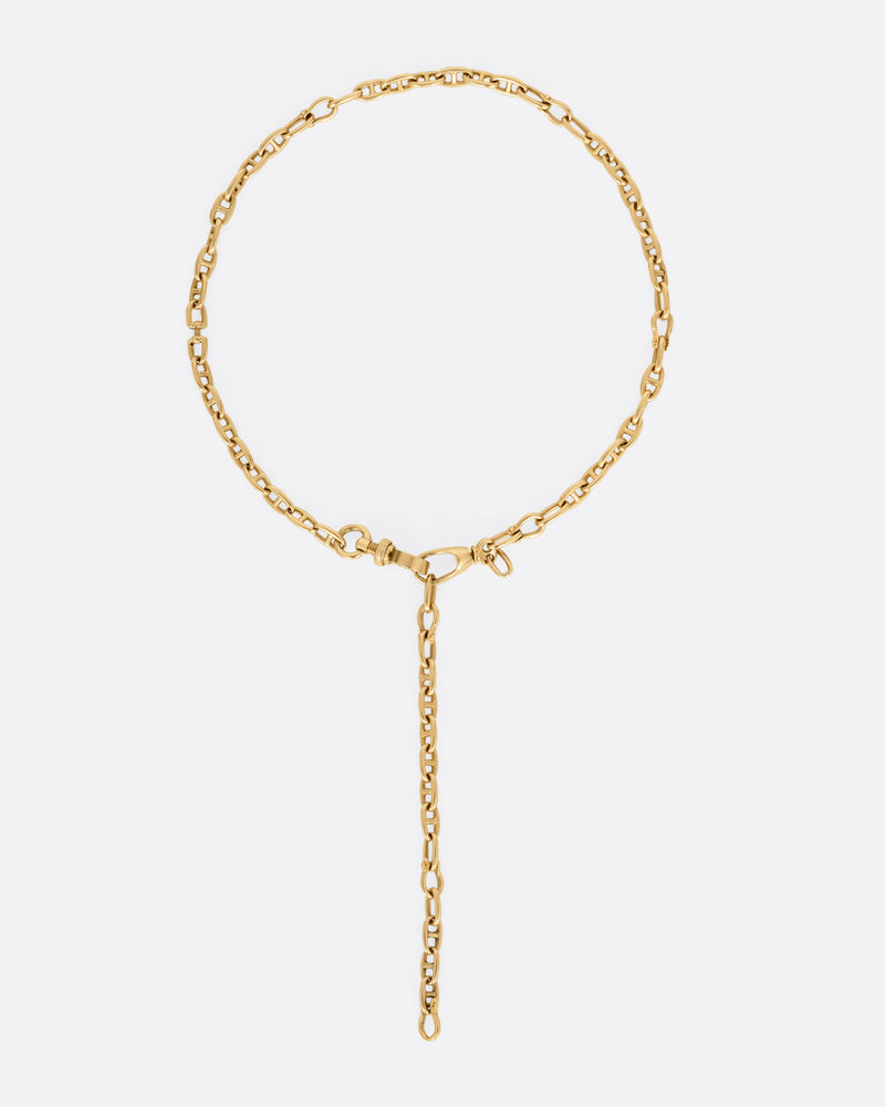 A rose gold mariner watch chain necklace, shown with the clasp in front.