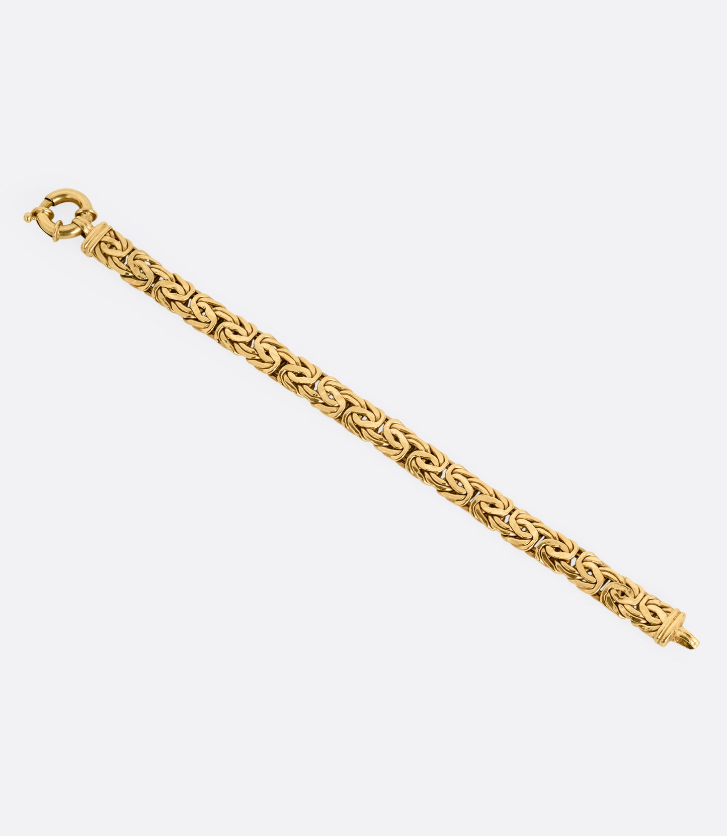 A yellow gold byzantine chain bracelet, shown from the front.
