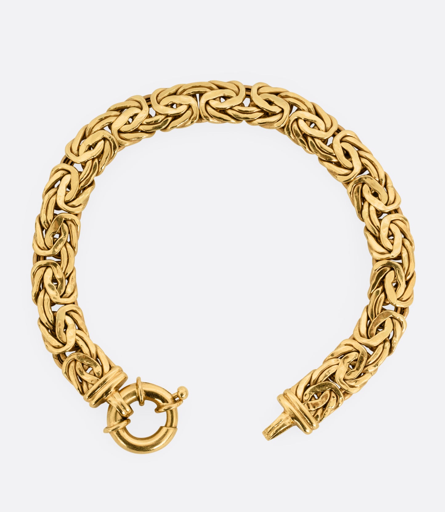 A yellow gold byzantine chain bracelet, shown from the front.