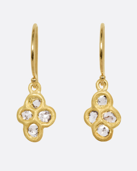A pair of yellow gold drop earrings with four rose cut diamonds, shown from the front.