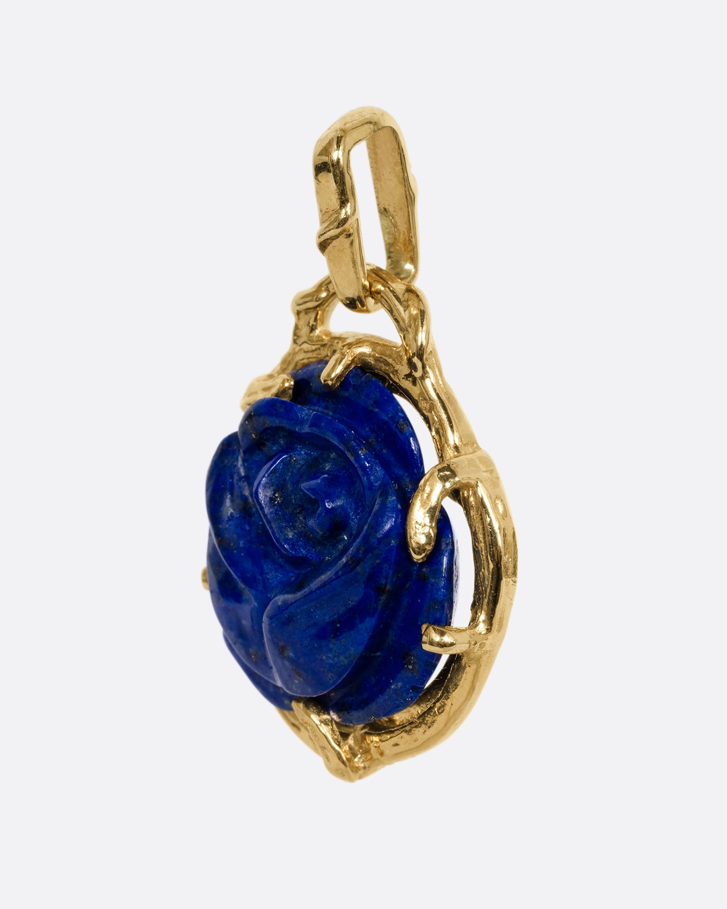 yellow gold rose shaped lapis charm shown from the side