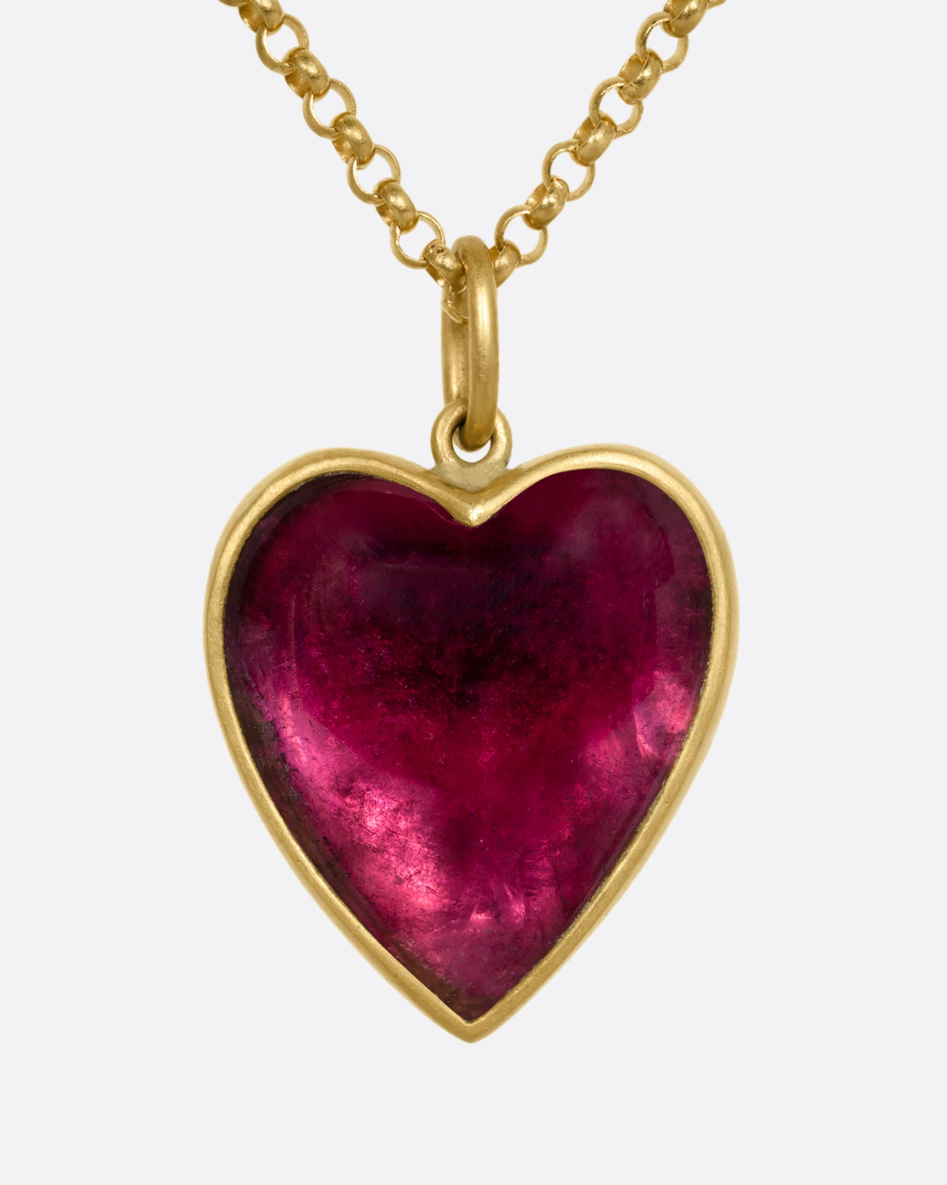 yellow gold necklace with a heart shaped tourmaline shown from the front