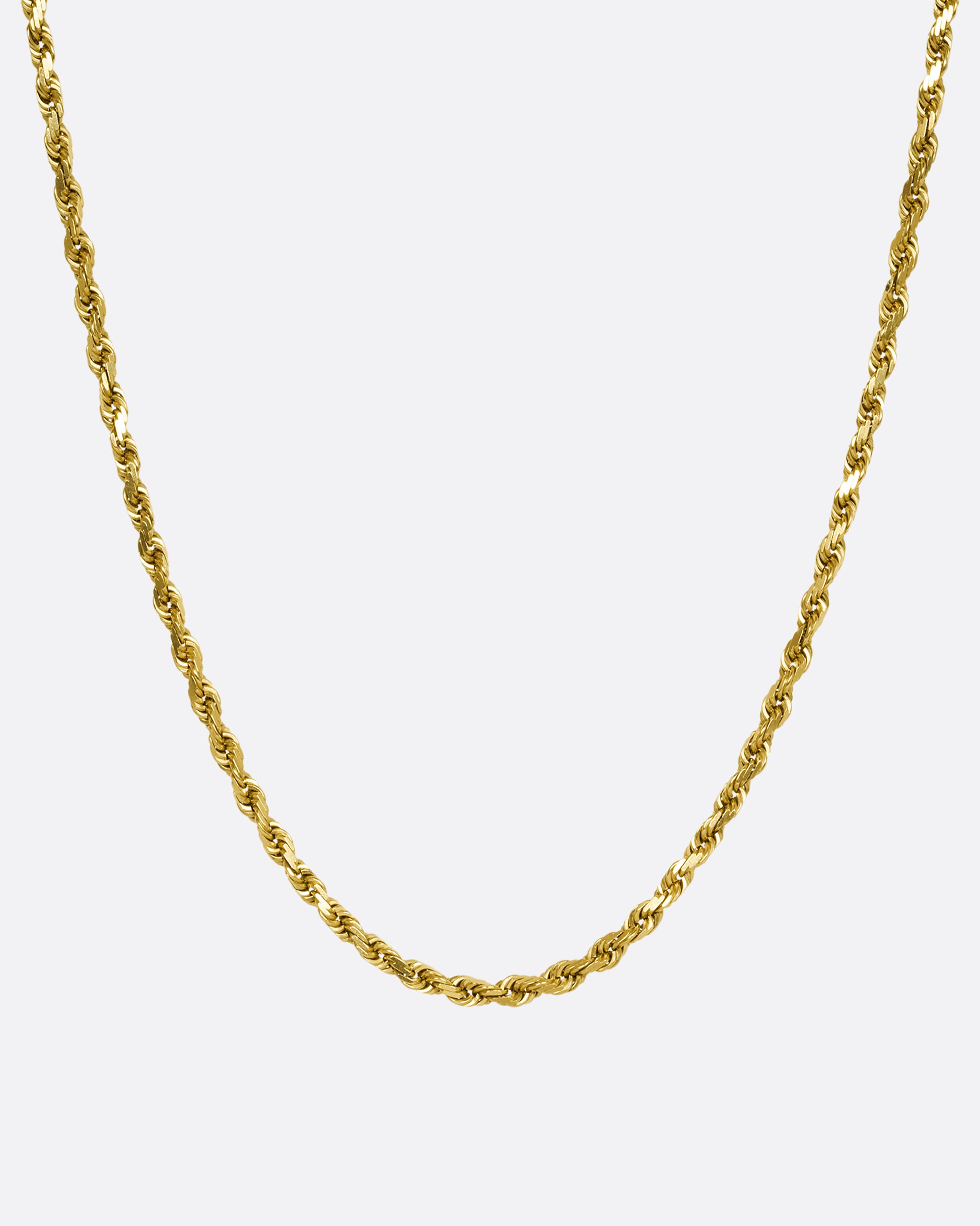 A yellow gold twisted rope chain. Shown hanging from the front.