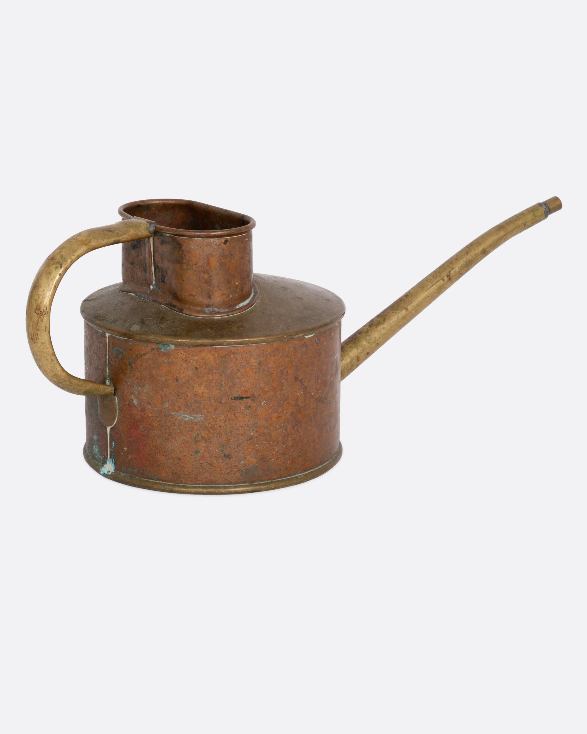 A vintage oil can shown from the back.