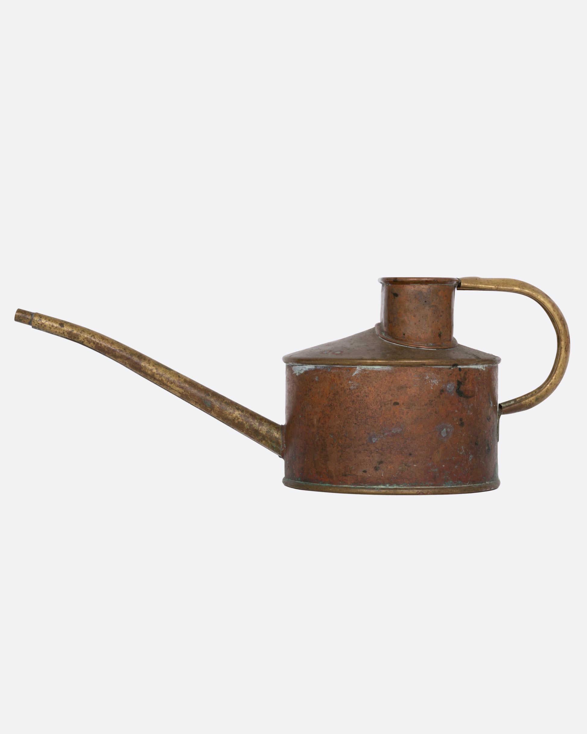 A vintage oil can shown from the side.