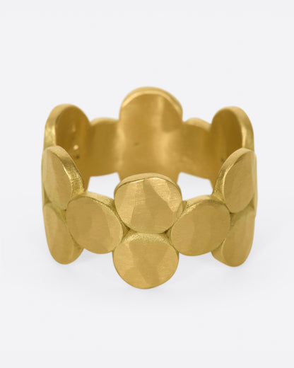 Matte yellow gold disc band, front view of the discs with the inside of the band visible