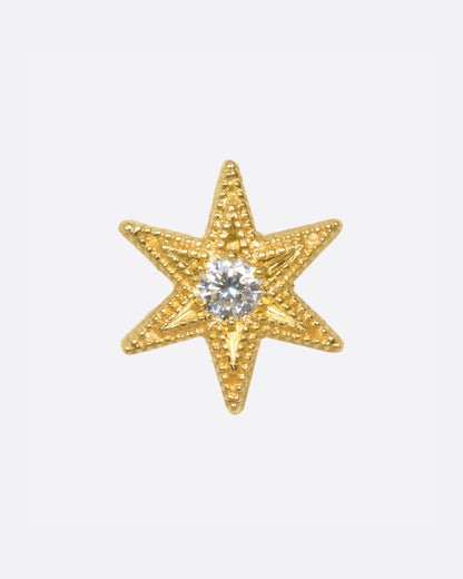 A six point star with millgrain texture and a bright white diamond center. Shown from the front.