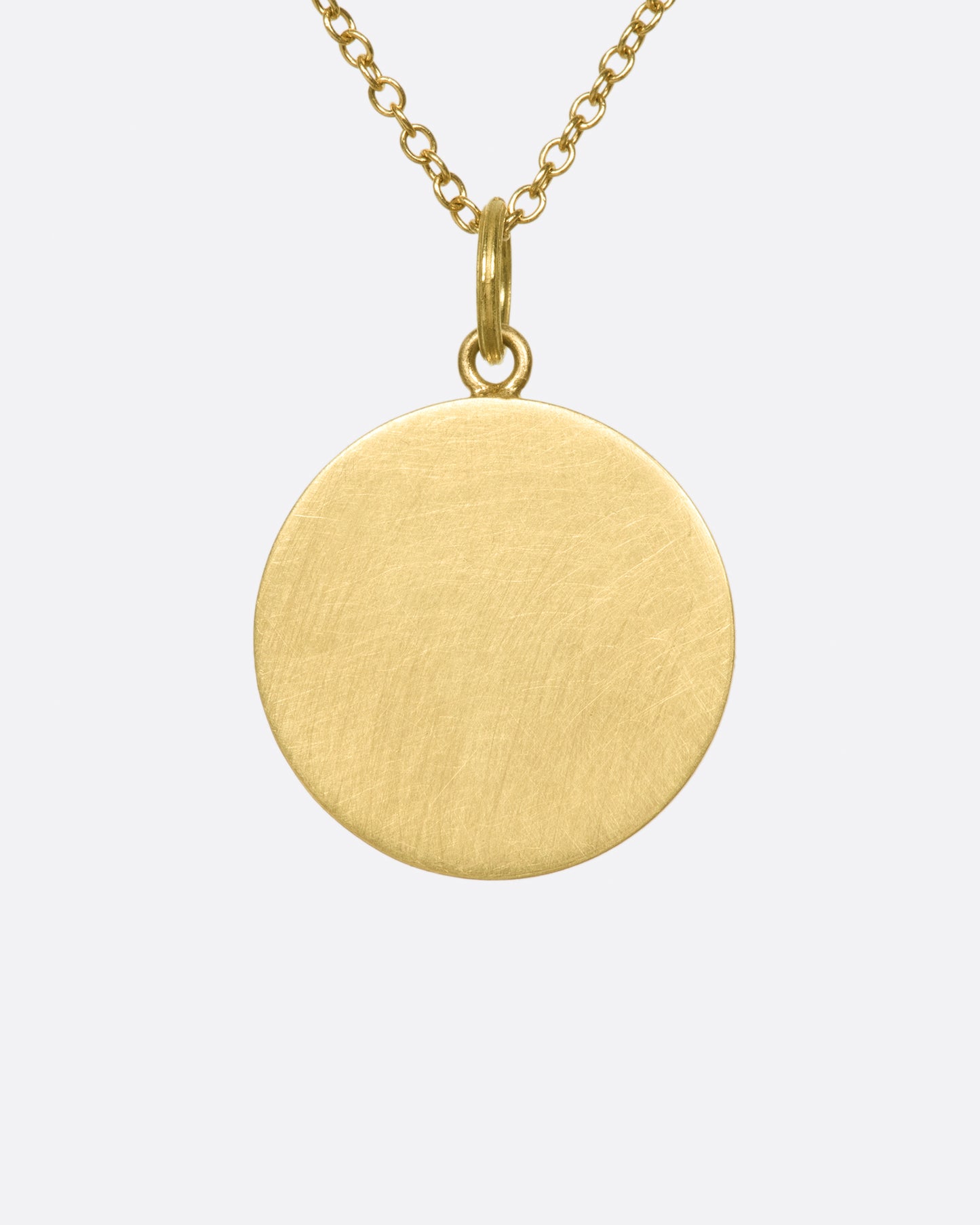 A solid, heavy pendant with a striking, sensual design with a sense of humor.