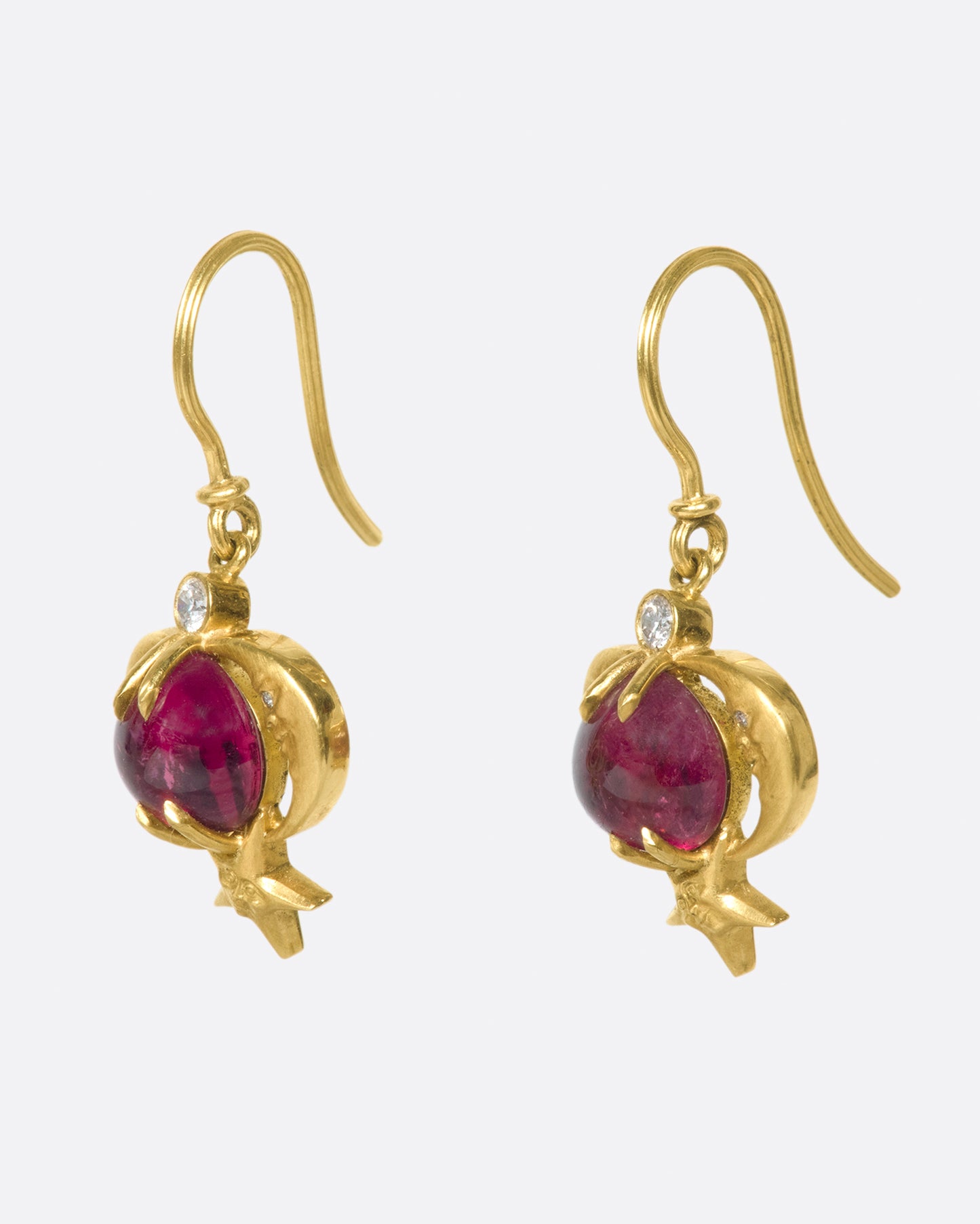These earrings tell a story about the cosmos; a journey through the heavens and through the history of art.