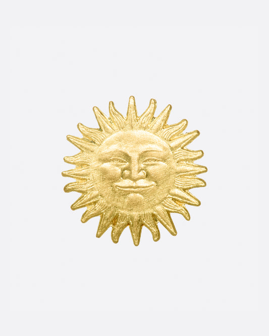 A tiny carved sunface stud to brighten up your day!