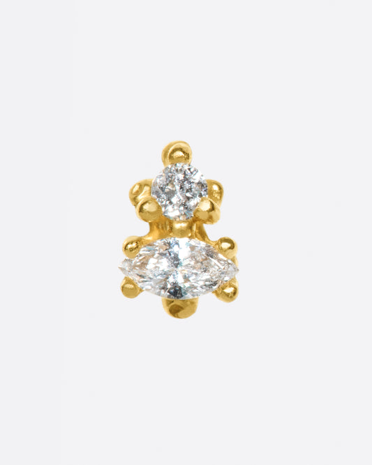 A stacked diamond earring with Ruta Reifen's signature textured prong settings.