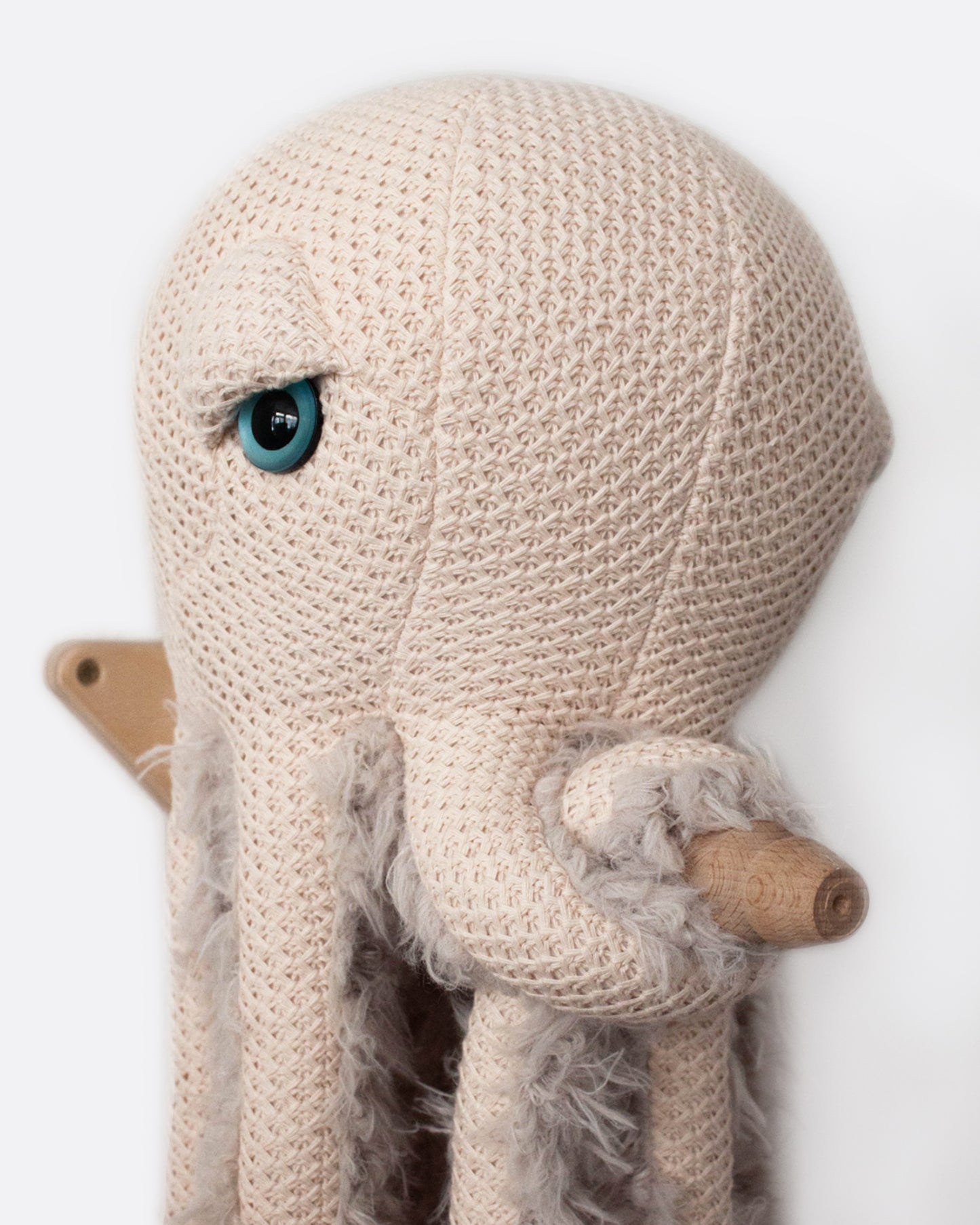 This pale pink octopus is made with strong stitching and premium fabrics; it was born to last and stay by your side.