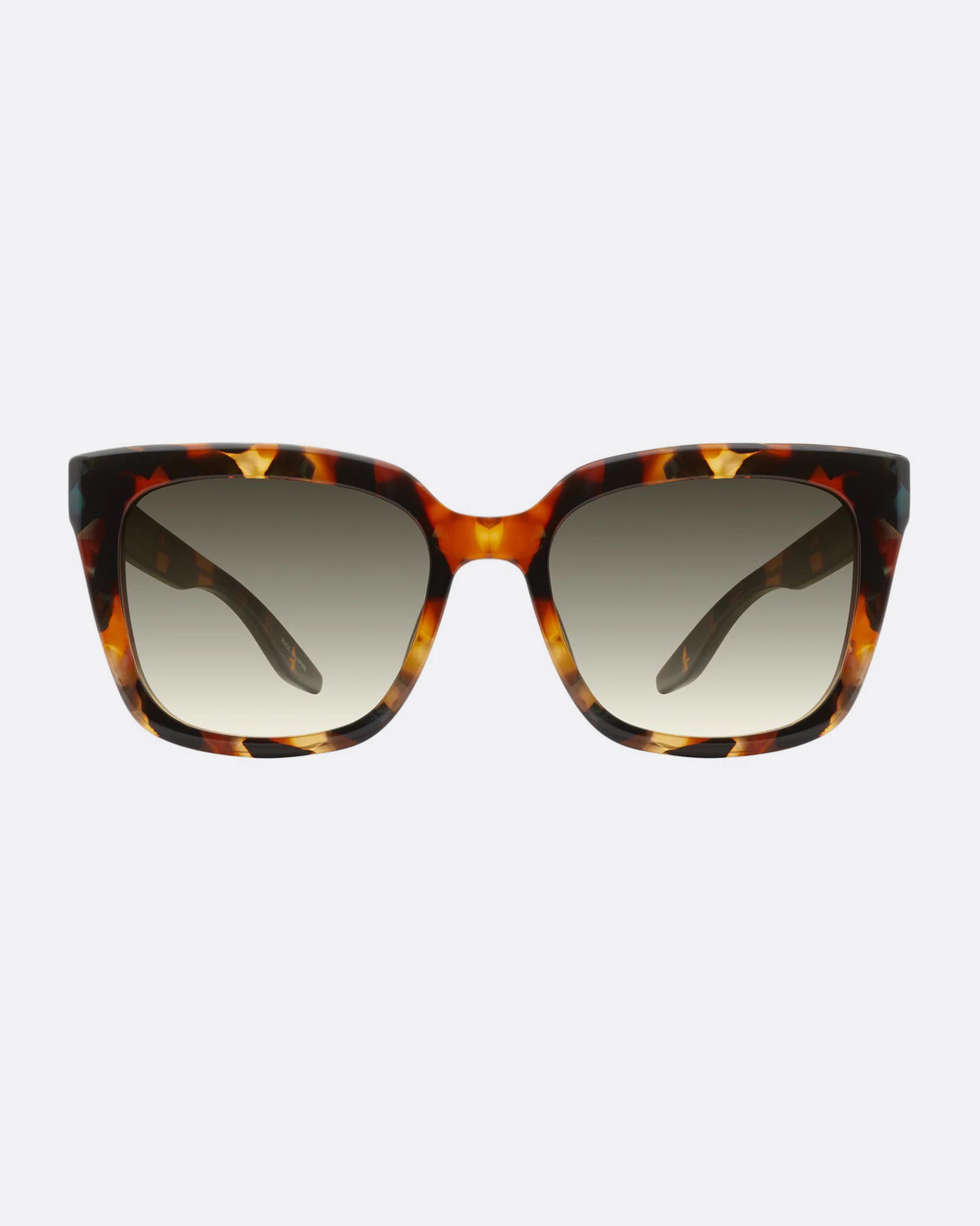 A pair of sunglasses with thick, squared tortoiseshell frames and olive gradient lenses. Shown from the front.