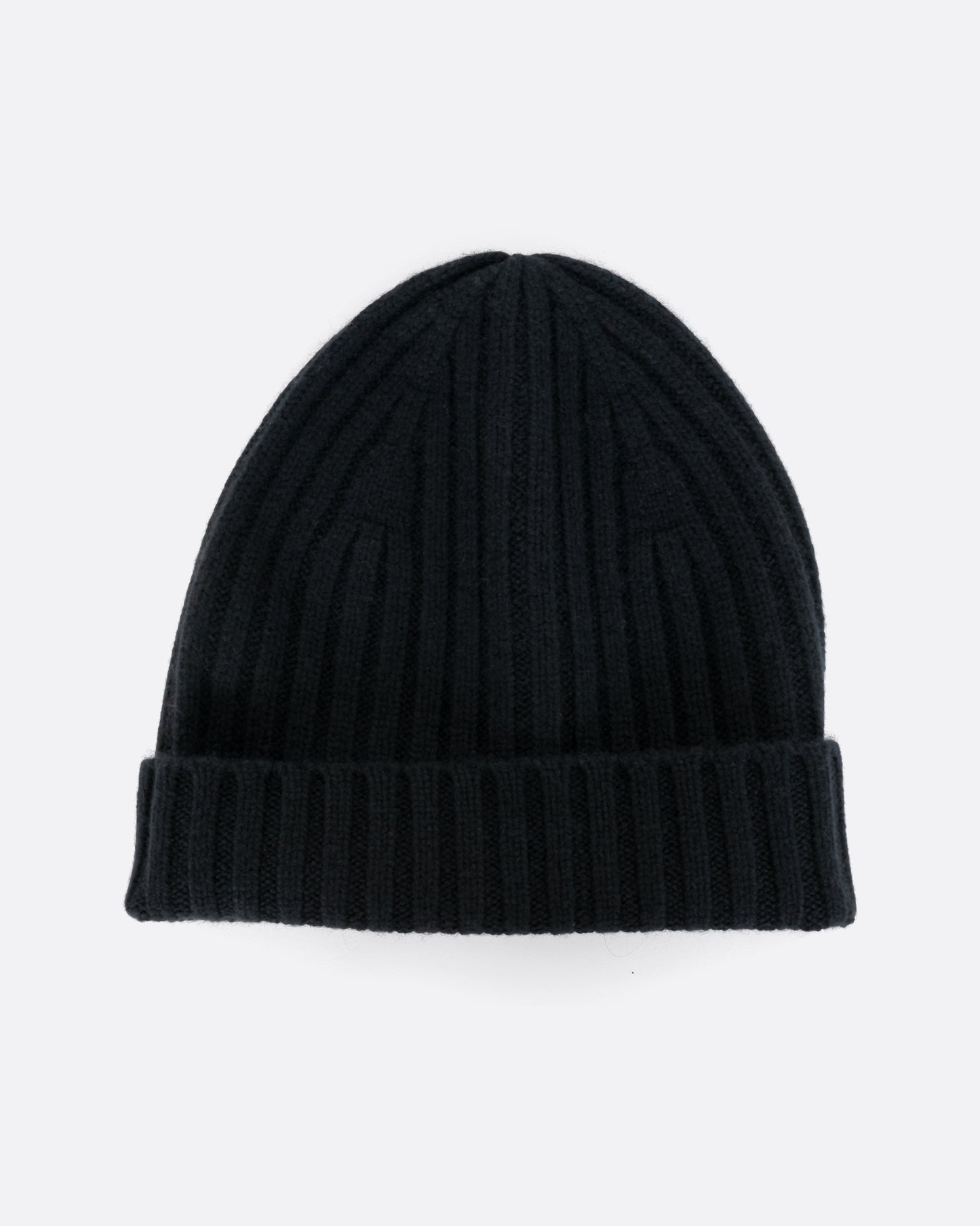 A black cashmere beanie, shown laying flat and folded.