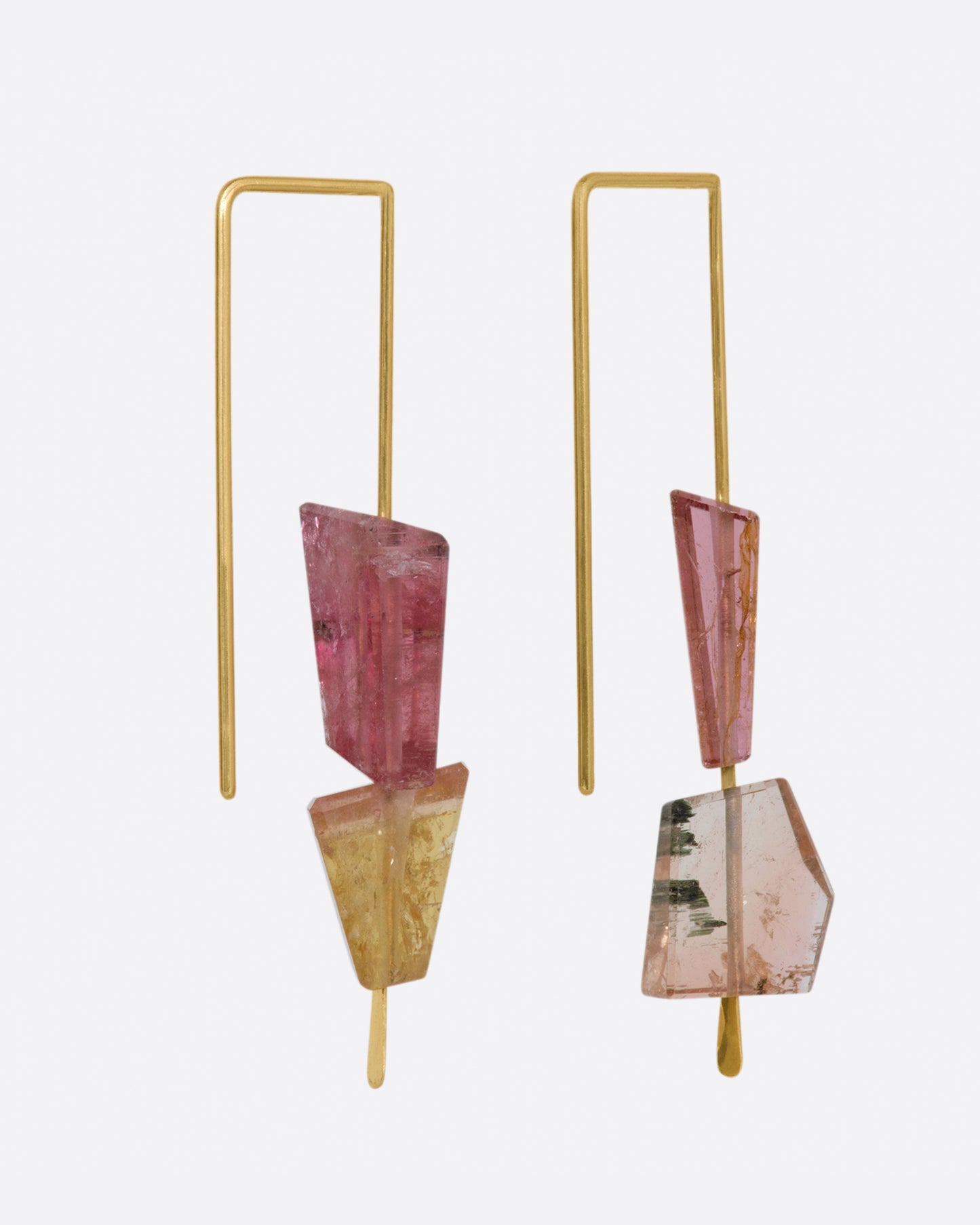 Yellow gold rectangular hook earrings with two pink tourmalines on each. View from the side.