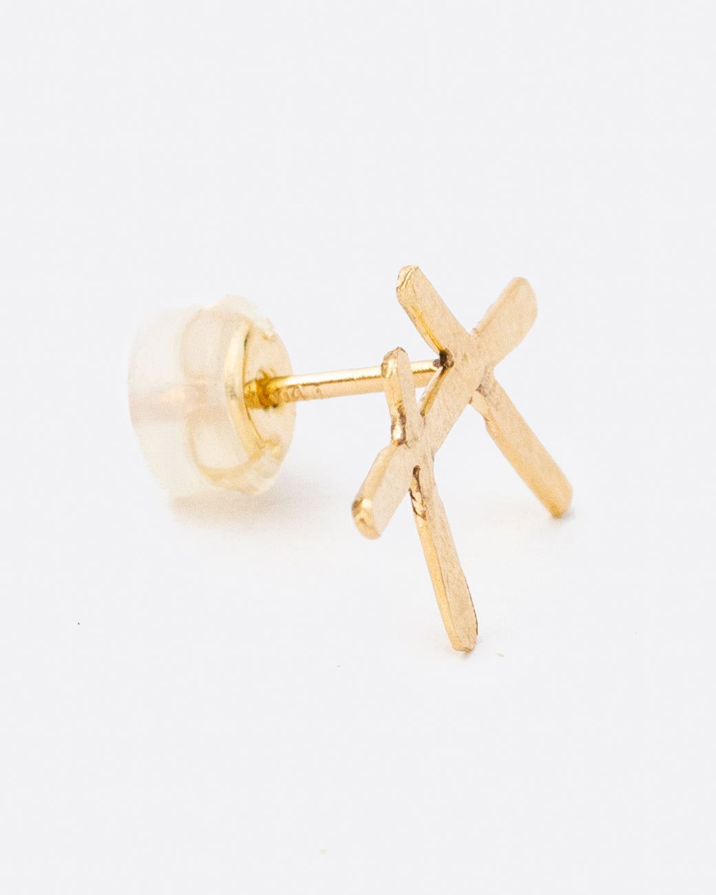 A single earring made from three strands of hammered, fairmined gold.
