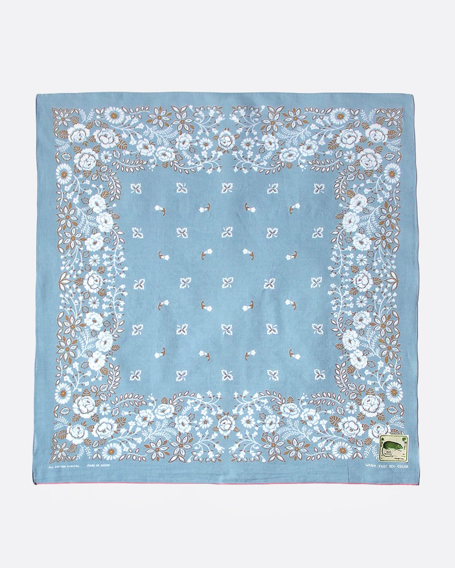 A blue bandana with a floral print, shown from the front.