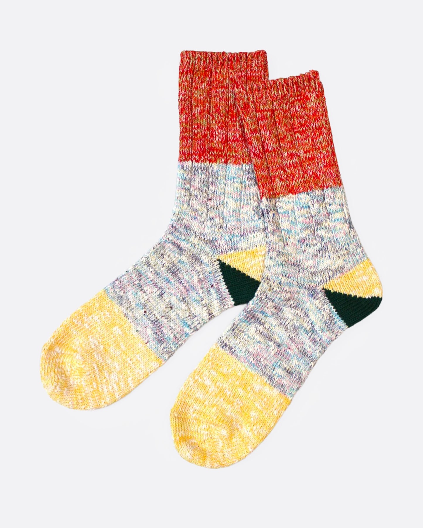 A pair of multicolored marl socks with dual-toned heels, shown from the side.