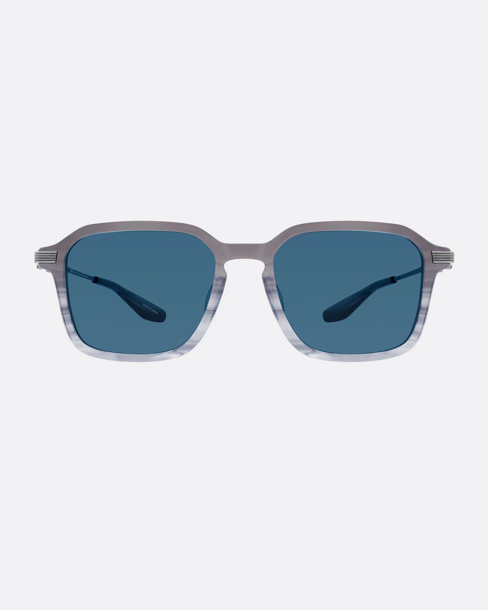 A pair of sunglasses with pearl gray frames and blue lenses. Shown from the front.
