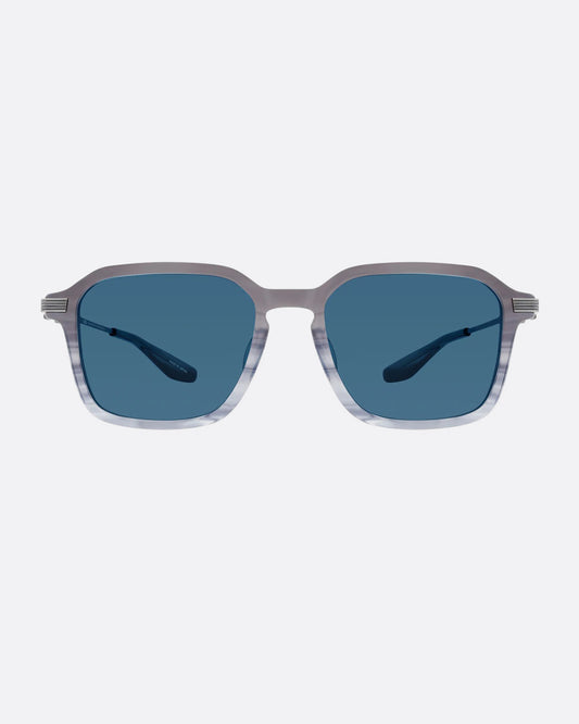 A pair of sunglasses with pearl gray frames and blue lenses. Shown from the front.