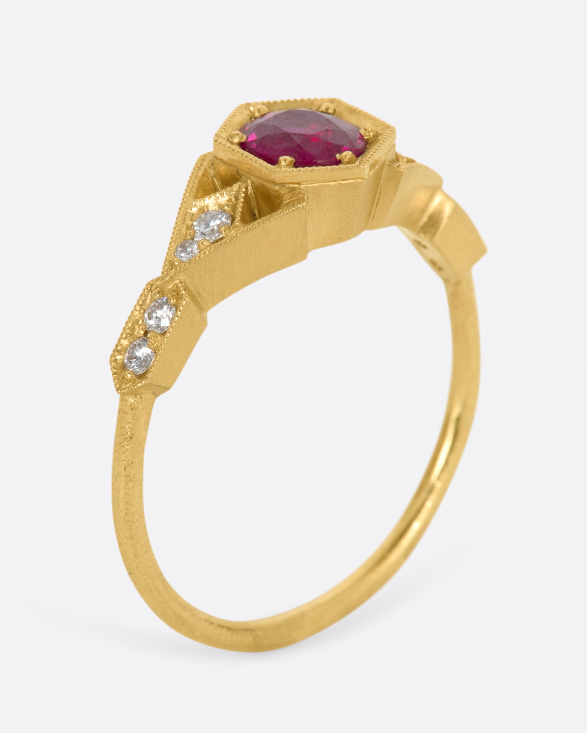 A new variation of DMD Metal's Vestra series, this time with a round ruby at its center.