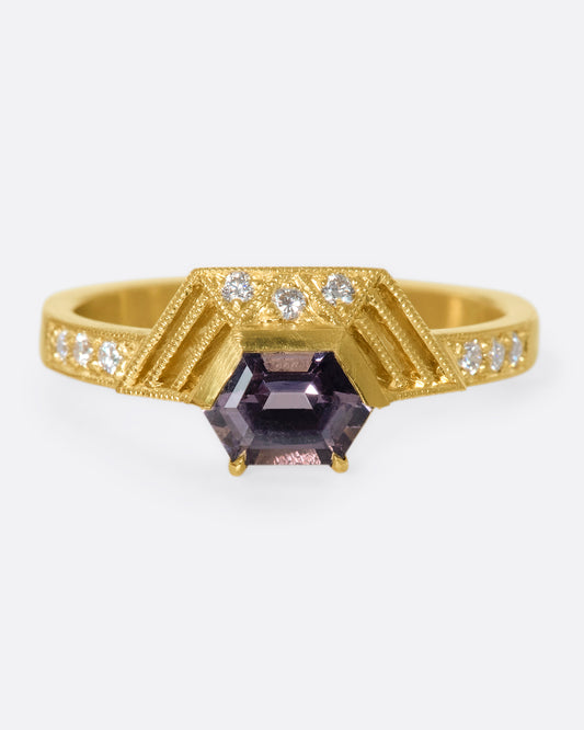 This one-of-a-kind lavender spinel ring dazzles on its own, or in a stack with other DMD Metal rings. The hexagonal half-halo feels like a modern twist on art deco design.