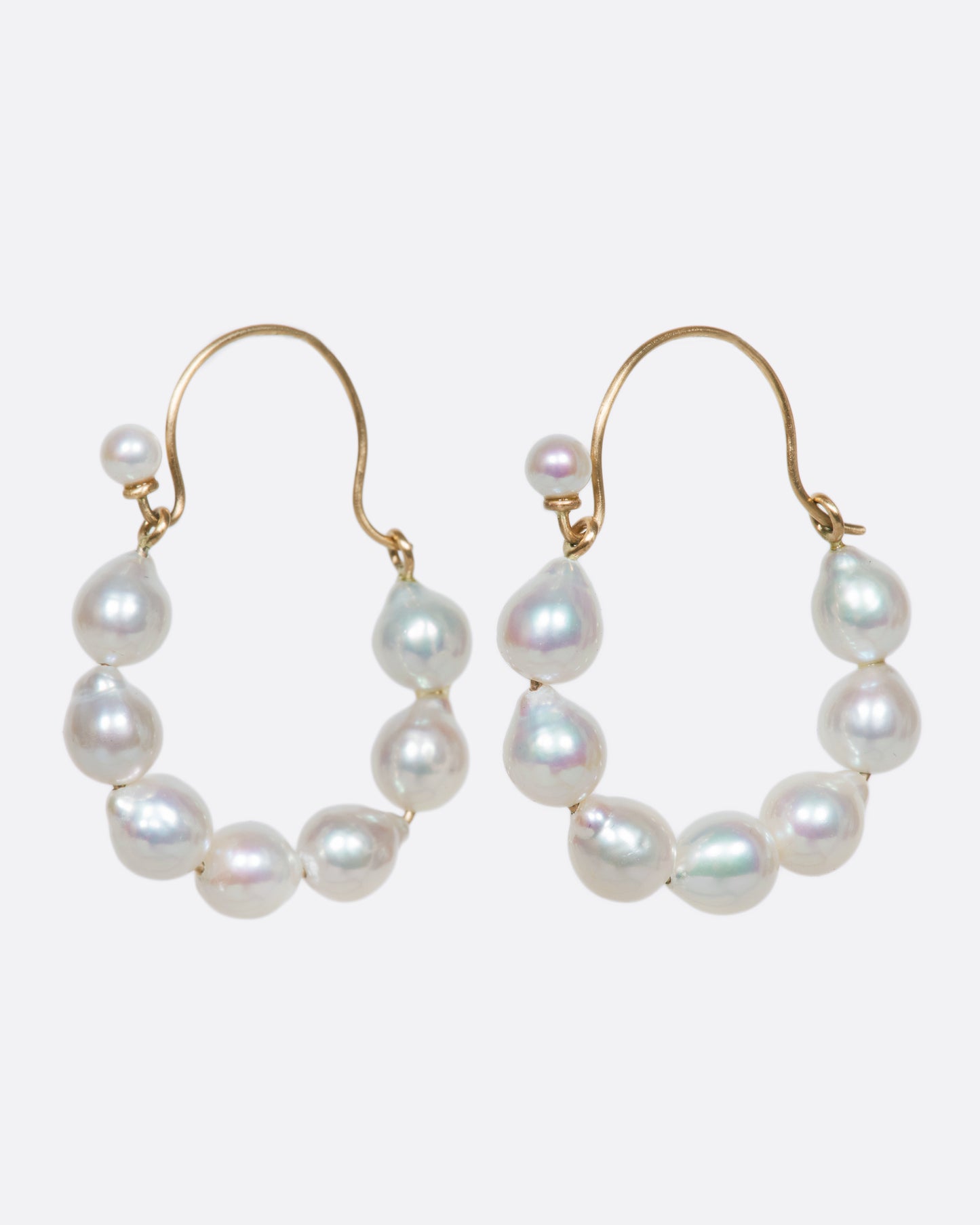 A lovely pair of baroque pearl hoops with a tiny pearl hiding the closure