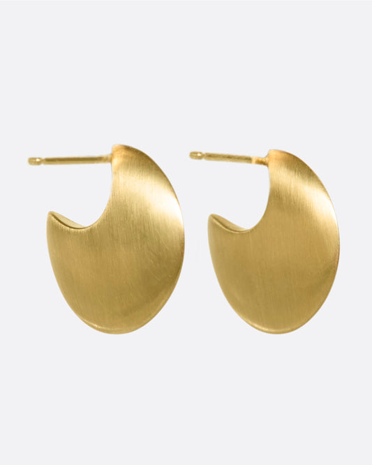 From the front, this pair of 10K solid gold hoop earrings look razor thin.
