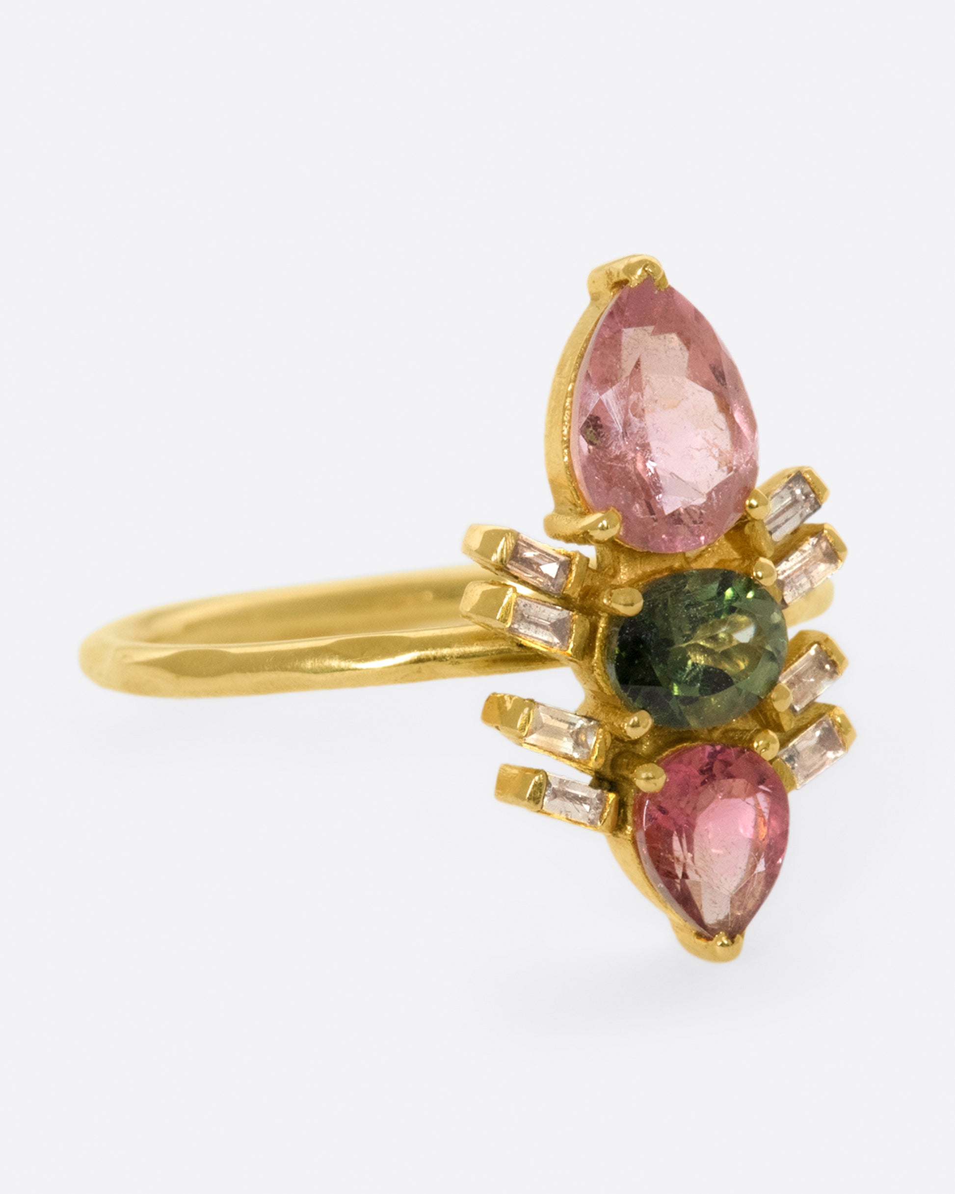 A garden-inspired pink and green tourmaline ring with baguette accents