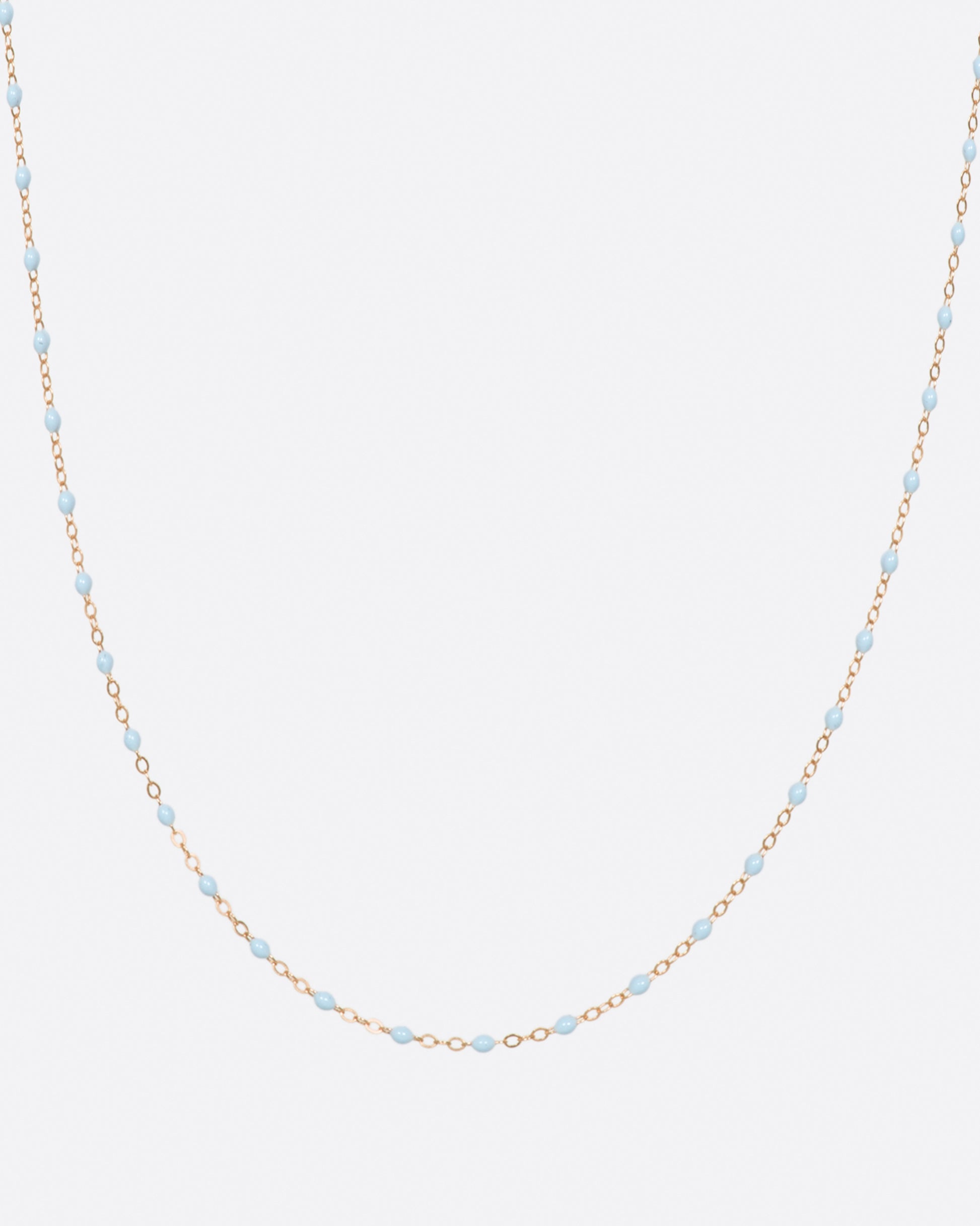Thin 18k gold chain necklace with resin beads. Each necklace is hand dipped in melted resin to create the beaded effect. 