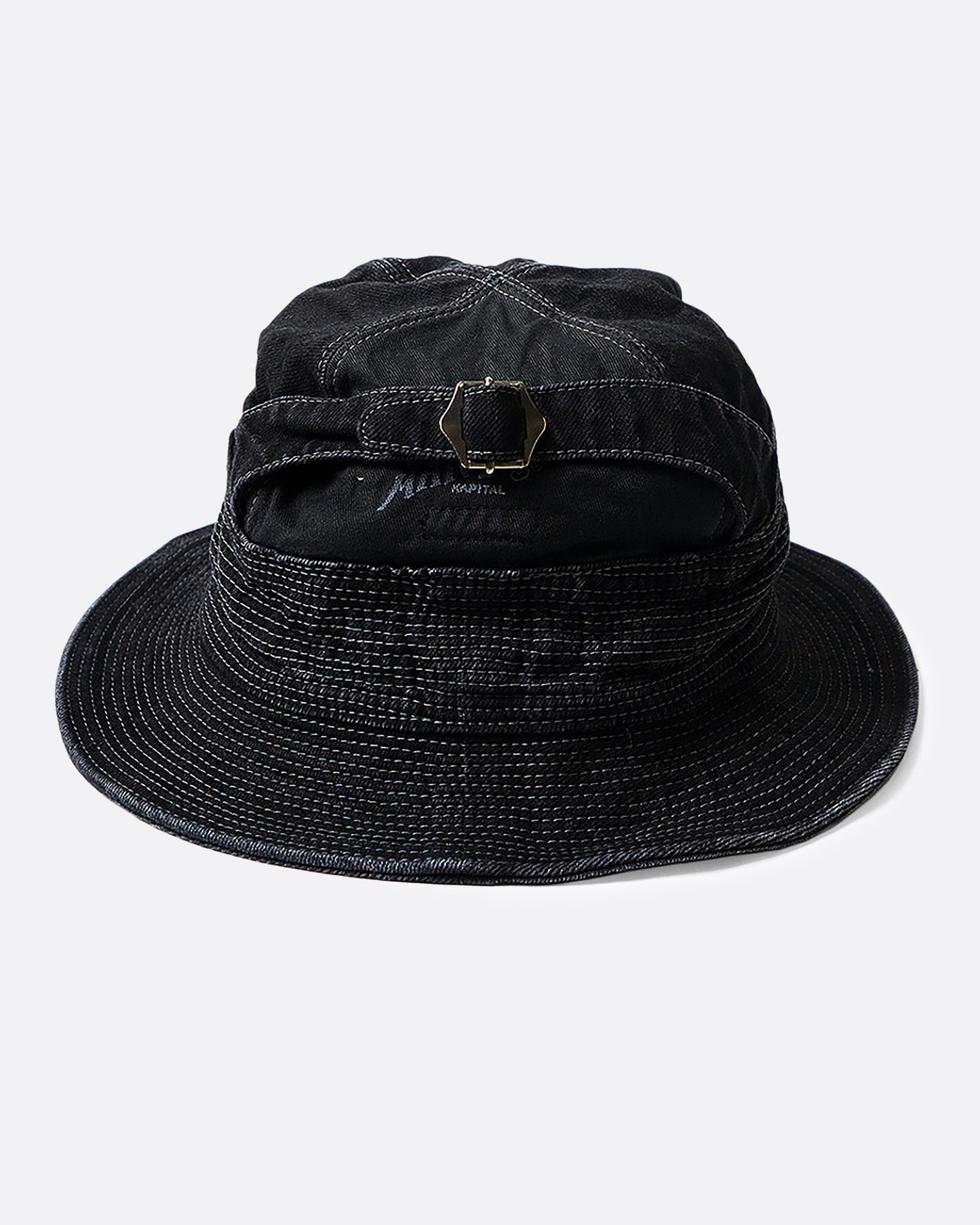 A black denim bucket hat with a buckle at the crown and contrast stitching throughout. View from the back.