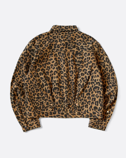 A leopard print leopard jacket in heathered wool with a silky lining. It has a snap button front and a cinch-able back. Shown from the back. 