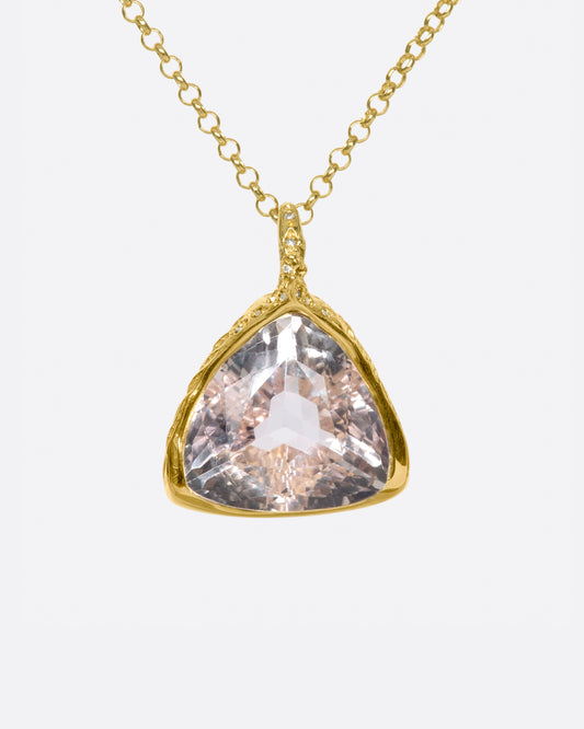 This stone pendant is nothing short of spectacular, but the added diamond accents around the setting don't hurt.
