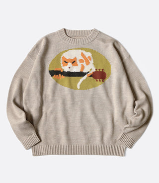 A 7g knit crewneck sweater with a design inspired by the Woodstock logo of 1969.